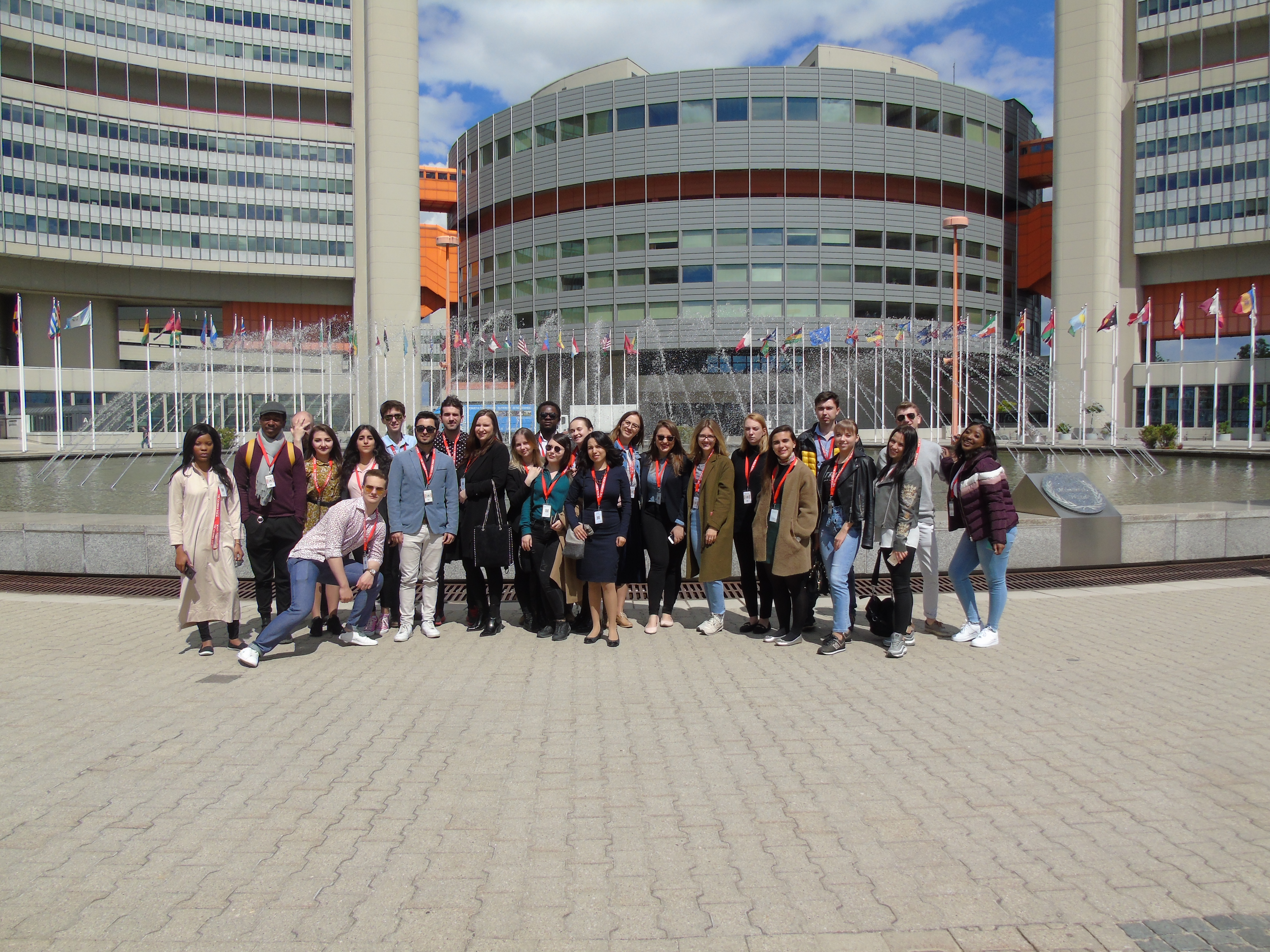 Photo of students in front of the building of the Organization for Security and Co-operation in Europe (OSCE)